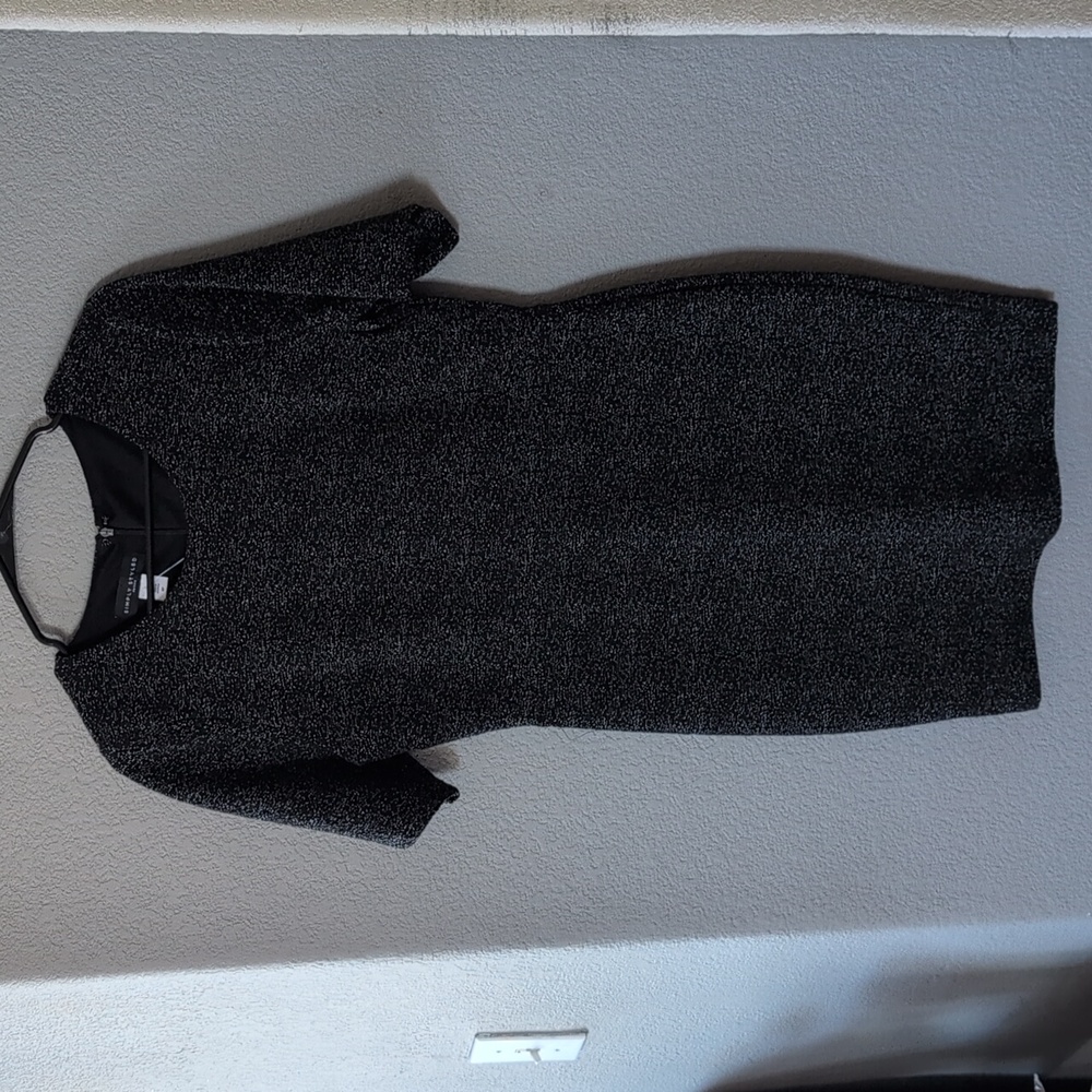 Simply styled black and white speckled dress